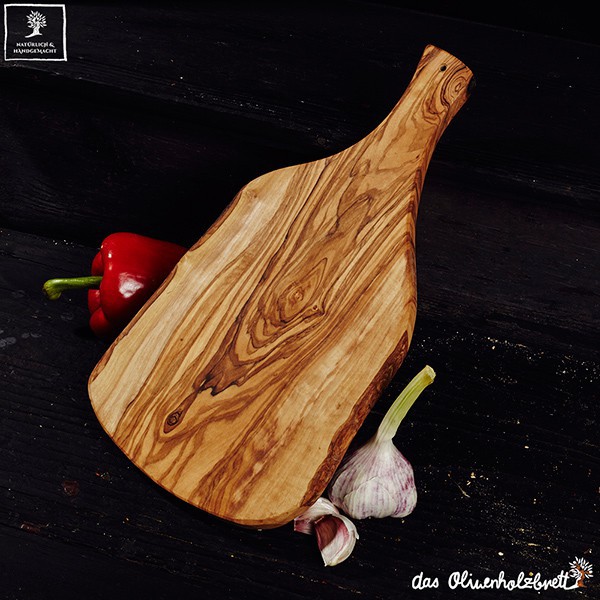 Natural shaped cutting board with handle and a hole for hanging