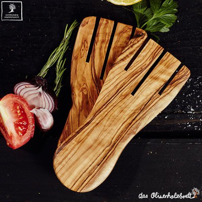 modern salald hands out of olive wood
